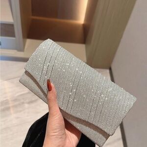 NWT! Elegant Silver Clutch Bag